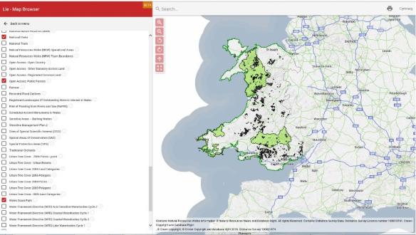 Map of Wales on Lle, showing Wales Coast Path, Public Forests and National Parks