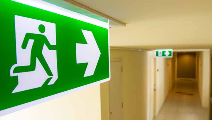 This image shows an exit sign within a building